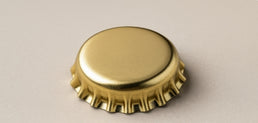 Złote kapsle koronkowe do butelek piwa – 26mm
